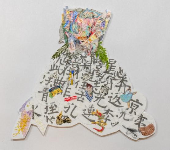 Dress-shaped collage with writing, leaves, and other images.