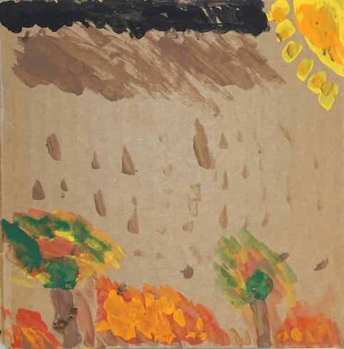 A forest fire with brown rain falling down.