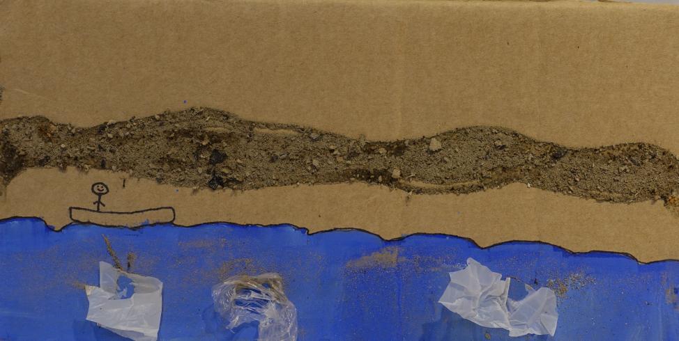 Figure in a boat at sea filled with plastic.