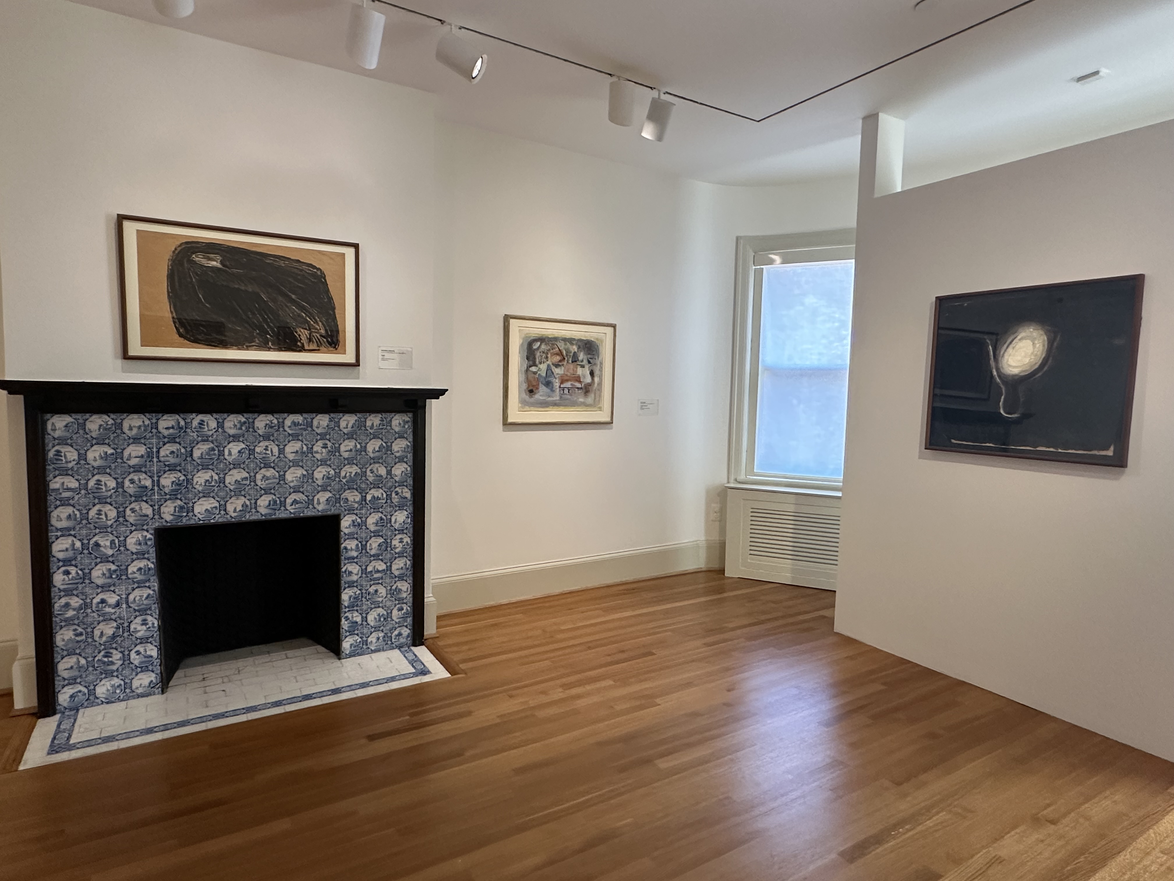 Installation photo of Gallery C with 3 artworks on the wall