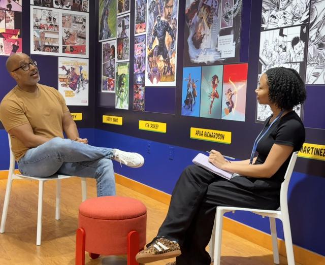 Shawn Martinbrough and Chantel Bennet chatting in the Brotherman to Batman exhibition