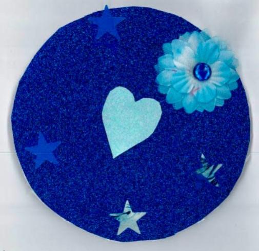 Circle with collage of a blue heart, flower, and stars.