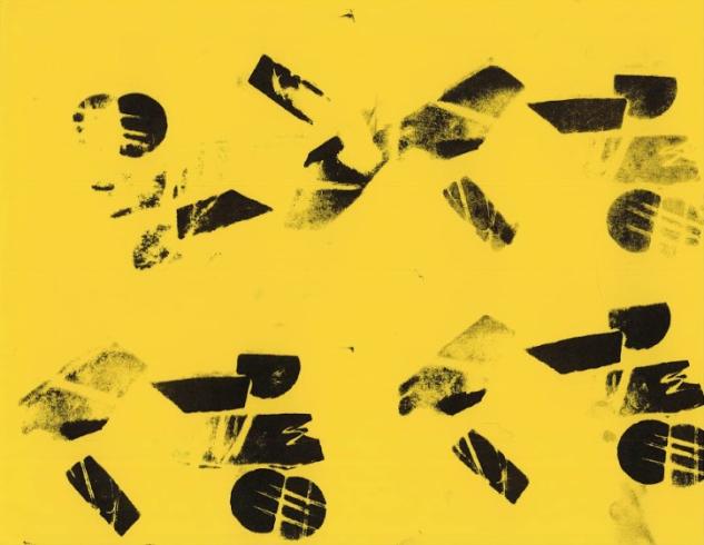 Pattern stamped on yellow paper.