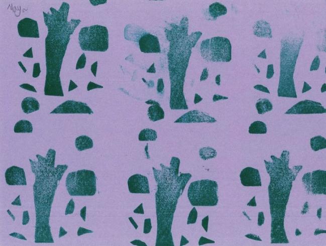 Tree pattern stamped on purple paper.