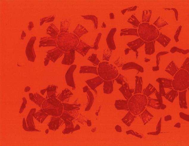 Orange pattern stamped on orange paper.