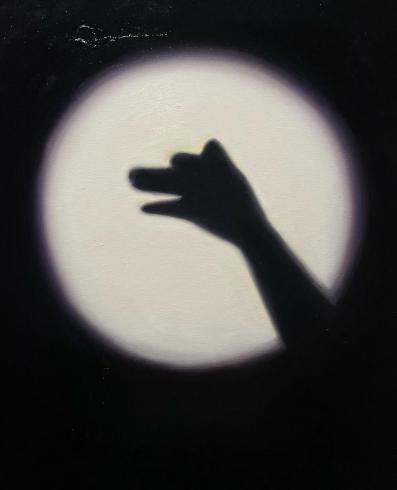 Painting of a shadow puppet of a wolf
