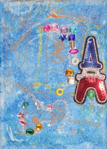 Blue painted canvas with gems and a red, blue Eiffel Tower.