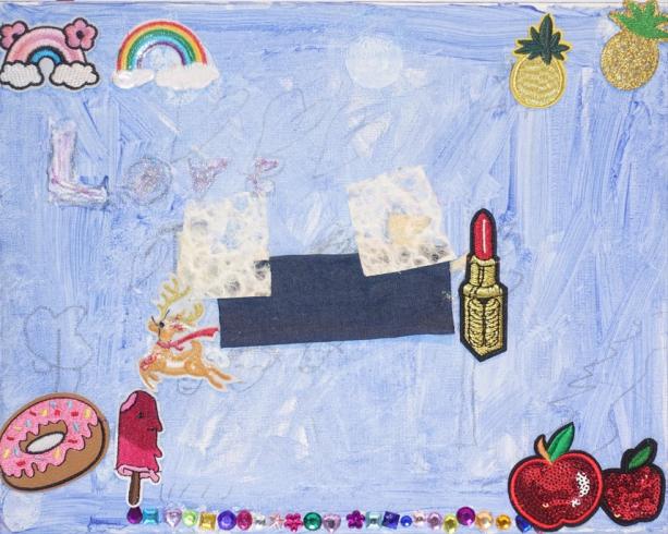 Painted canvas with stickers and gems.